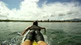 A man surfing a wave in Hawaii.