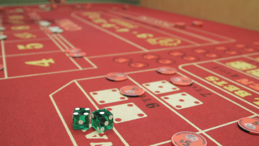 View of a crap table with people making bets