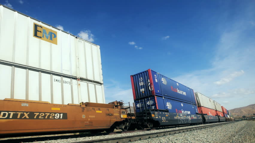 Los Angeles - Circa 2009: Moving freight train in Southern California in 2009. Freight train carrying storage containers through Southern California.