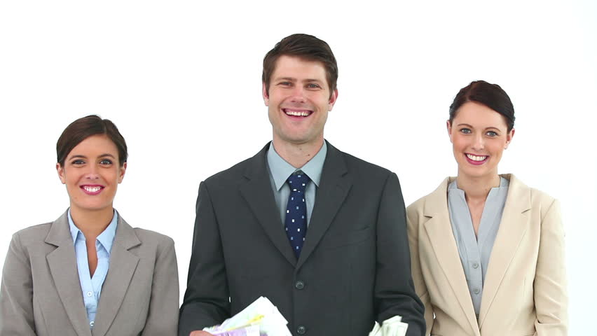 Happy business team throwing bank notes against white background
