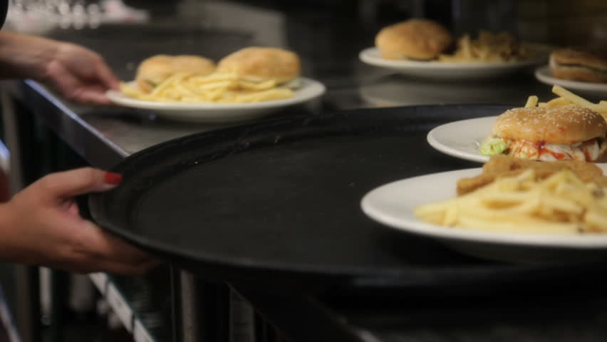 Waitress picking up orders