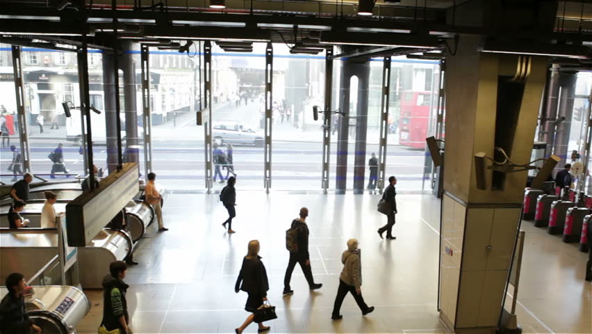 LONDON, UK - CIRCA APRIL 2012: People walking out of the tube station in London, UK