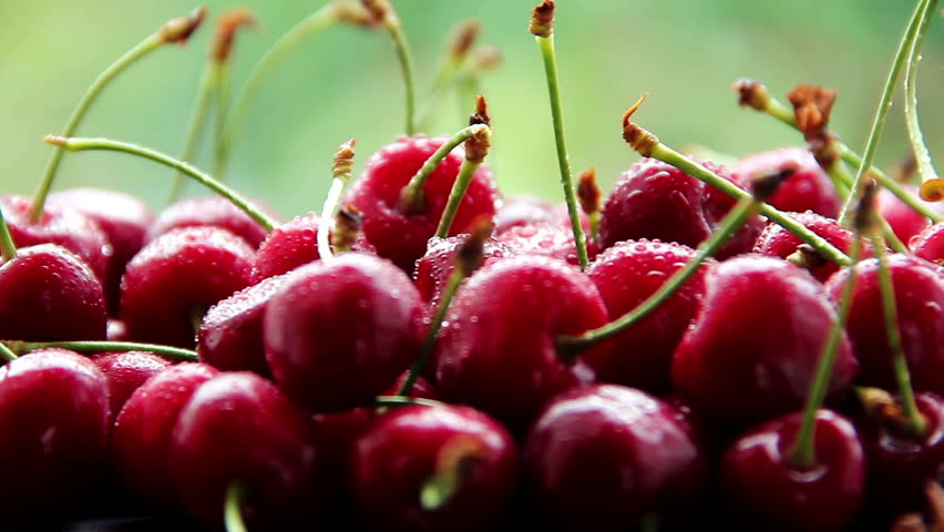 Fresh, ripe, juicy cherries rotate. Red cherry clockwise rotation
