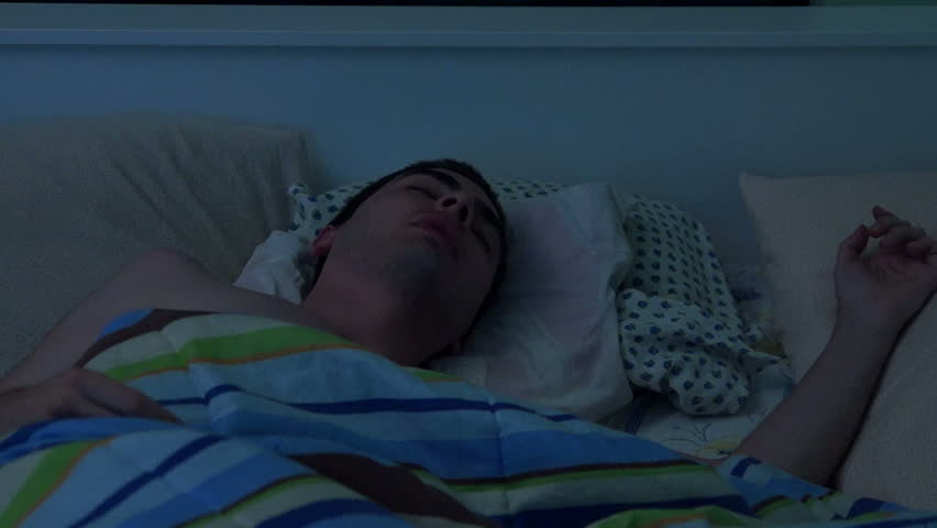 Man with sleeping difficulties. Insomnia disorder.