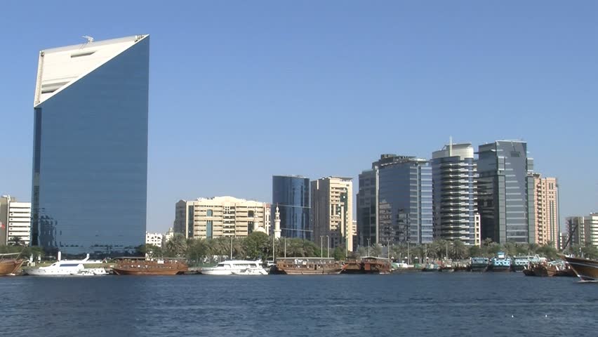 DUBAI - CIRCA 2012:  View of the Dubai Chamber of Commerce as seen from the Dubai Harbor in the United Arab Emirates.