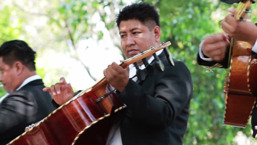 MEXICO - CIRCA SEPTEMBER 2011: Mariachi band plays at a celebration of the bicentenary of independence circa September 2011 in Mexico.