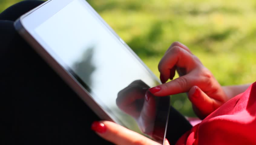 Woman with tablet computer