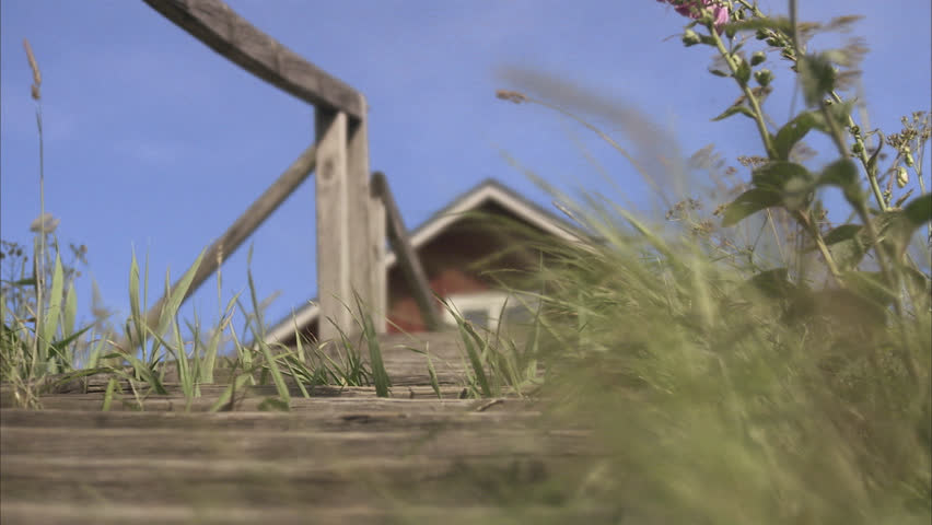 A woman walking up the stairs