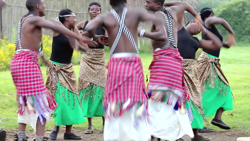 RWANDA, AFRICA - JUNE 16: Male & Female Tribal Dancers Perform Traditional Intore Dance (traditional Ballet of Rwanda) on June 16, 20012 in Rwanda, Africa. Drumming, Song, & Music is featured as well.