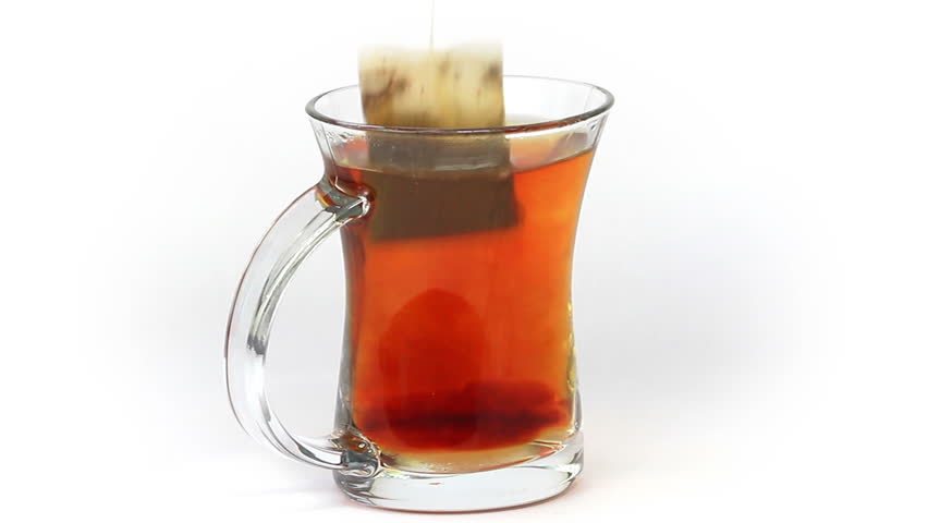Preparing Tea. (Timelapse) Pour boiled water into the cup. If desired, place some sugar. Remove the tea bag after a few minutes of steeping. Use teaspoon to stir contents. Relax and enjoy your tea!