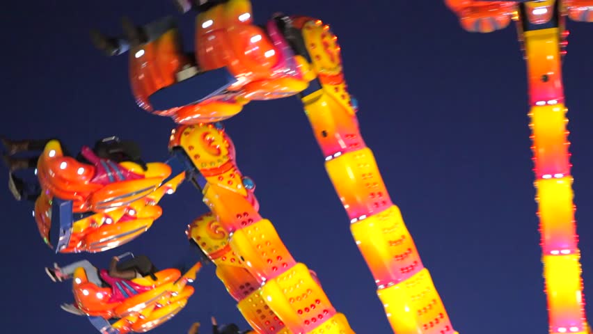 Large ride at amusement park at nigh.