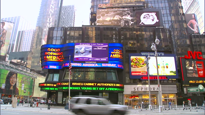 New York, NY - CIRCA 2006: Traffic goes down the street in Times Square during the day, when it is least crowded