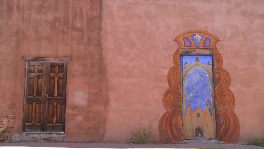 SANTA FE, N.M. - CIRCA 2010 - Beautiful painted adobe doors in Santa Fe, New Mexico.