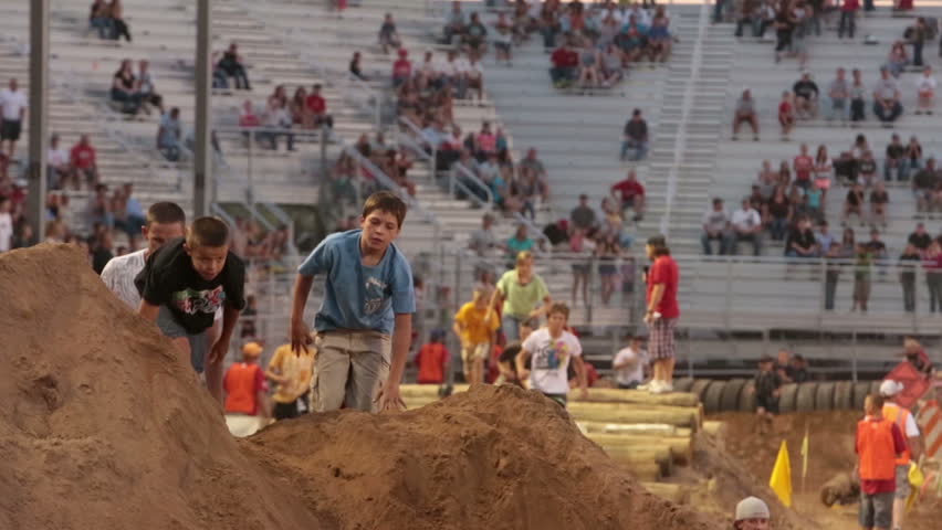 NEPHI, JUAB, UTAH 30 JUN 2012: Annual rural event where people run the obstacle course people at Juab County extreme enduro. Economic and team building ties to community.