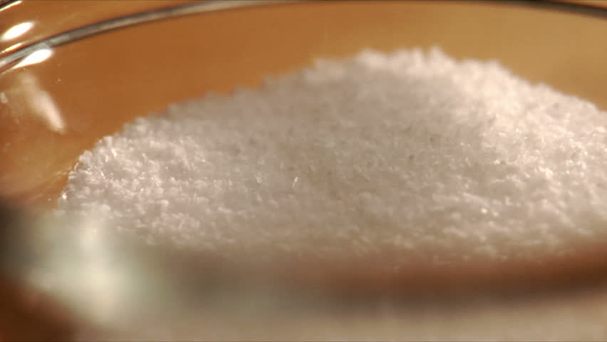 Chef reaches in for pinch of salt