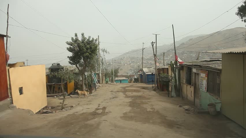 video footage of a car trip in Slums of the north of Lima, Peru