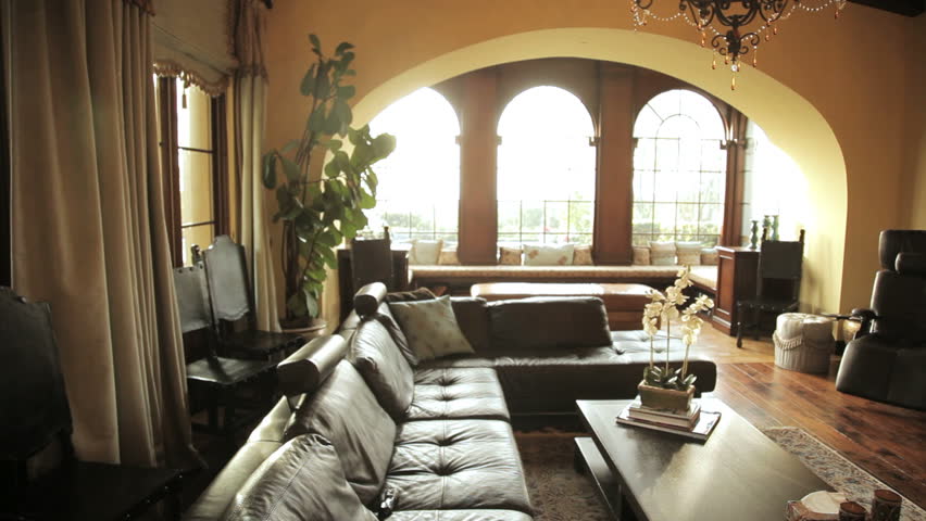 Panning shot of a sitting room in an expensive home