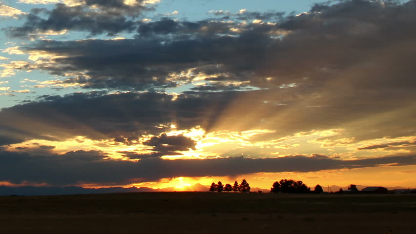 Glorious summer sunset after a rain storm. HD 1080p time lapse.