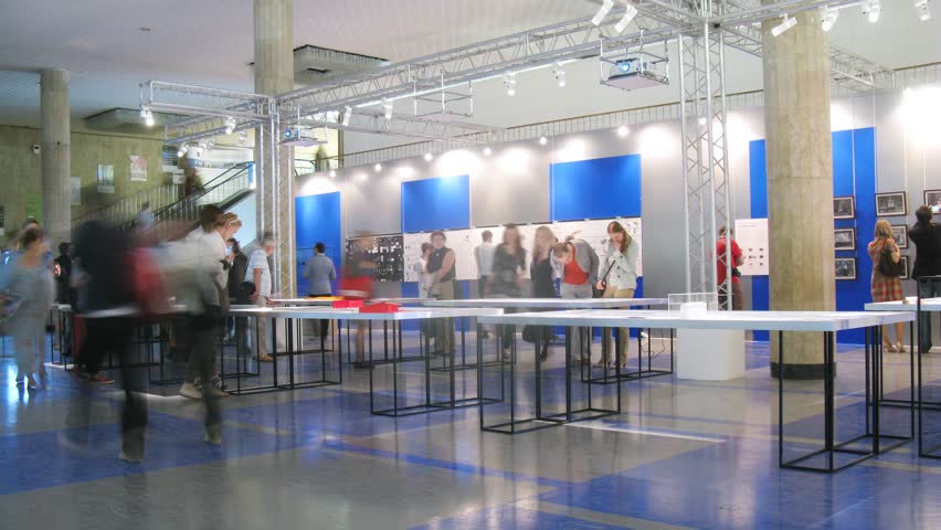 MOSCOW - MAY 23: (Timelapse View) Visitors go on hall at exhibition of architecture and design of Arh Moscow in Central House of painter, on May 23, 2012 in Moscow, Russia
