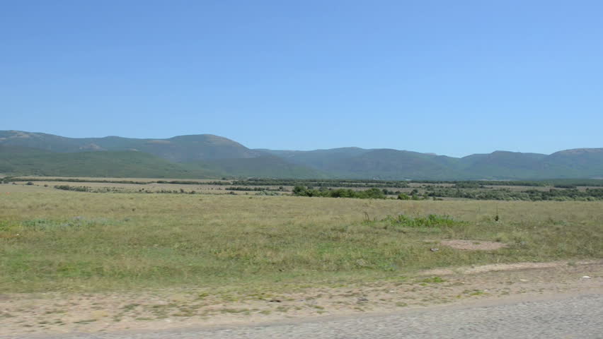 View on rural locality and storage pool from the window of car. Fast motion_x2