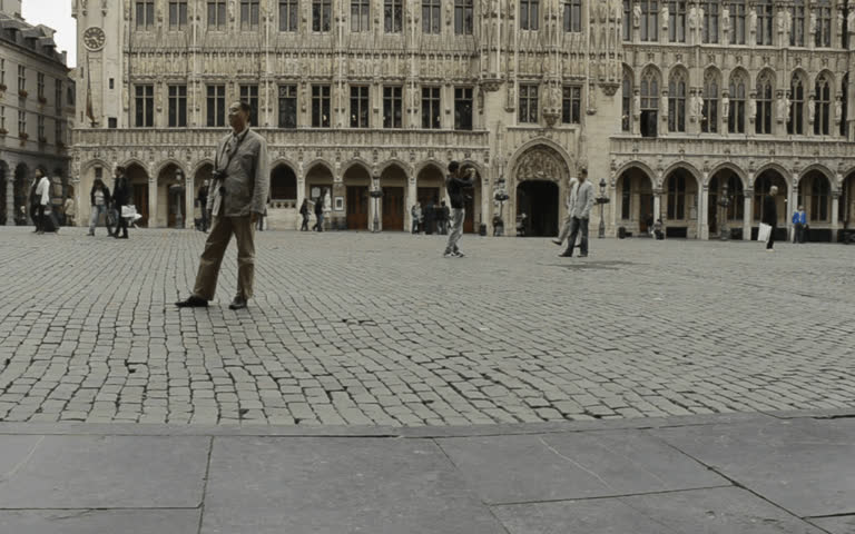 BRUSSELS, BELGIUM - JUNE 13: tourists wander in the Grand Place on June 13, 2012 in Brussels, Belgium. The Grand Place is the most famous location in Brussels and is a UNESCO World Heritage Site.