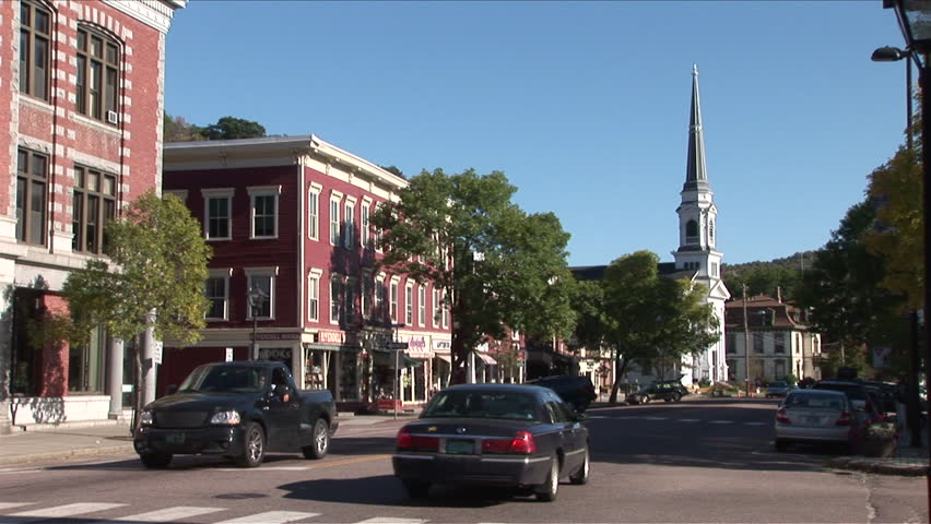 Montpelier, Vermont - CIRCA September 2007: Traffic rolls down a quiet country town during the day