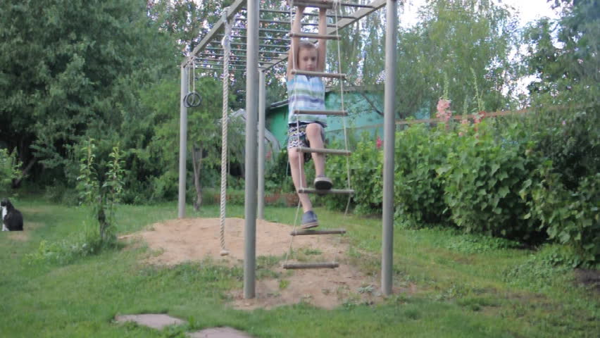 two boys exercising on gymnastic playground