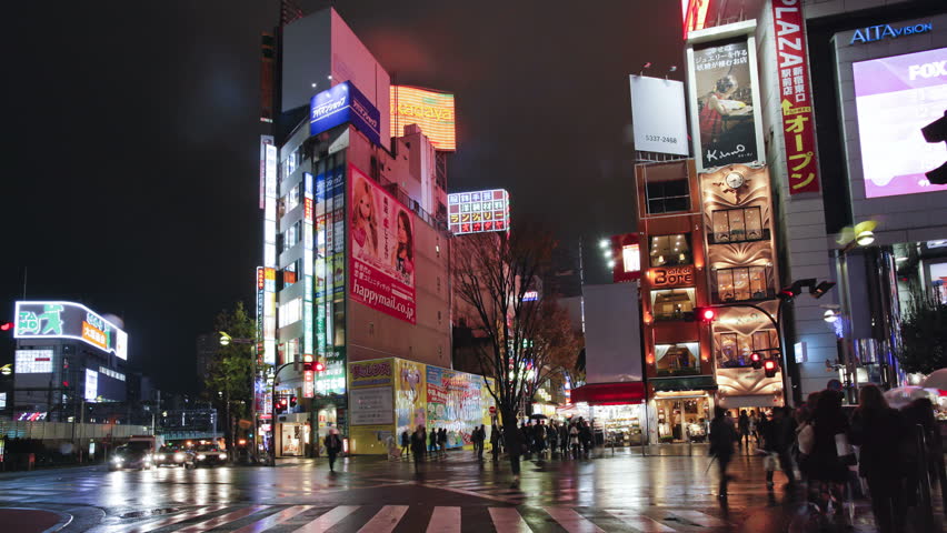 TOKYO, JAPAN - CIRCA MAY 2011: Streets at night seen from driving car, Shinjuku Ward.