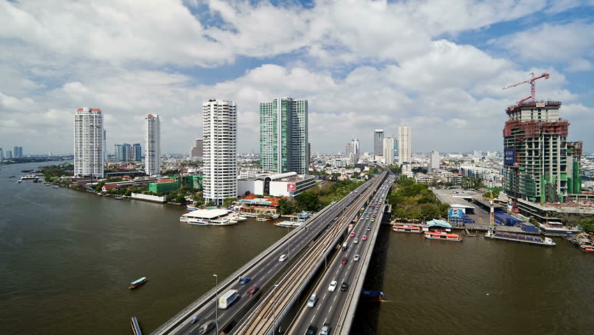 BANGKOK, THAILAND - CIRCA MAY 2011: Bangkok and the Chao Phraya River crossed by Modern Motorway system.