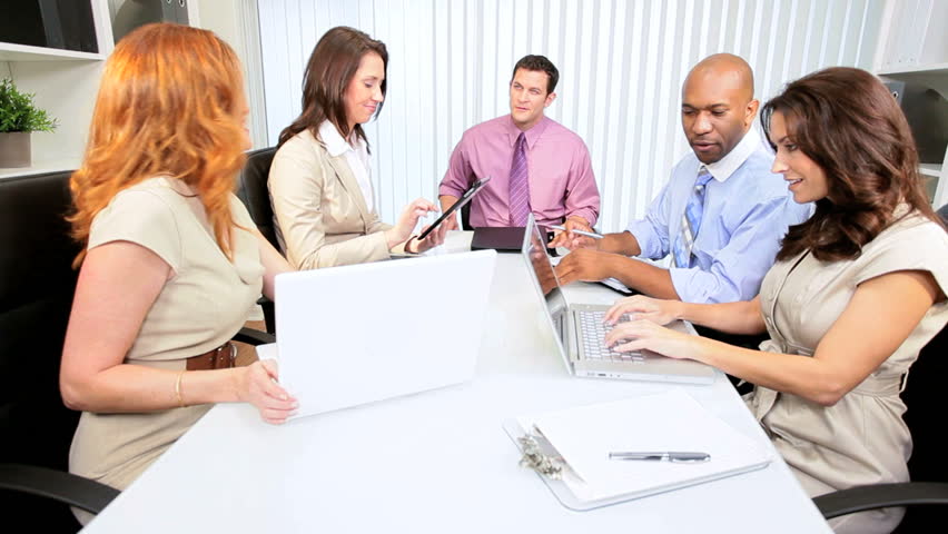 Young advertising agency team working modern wireless technology