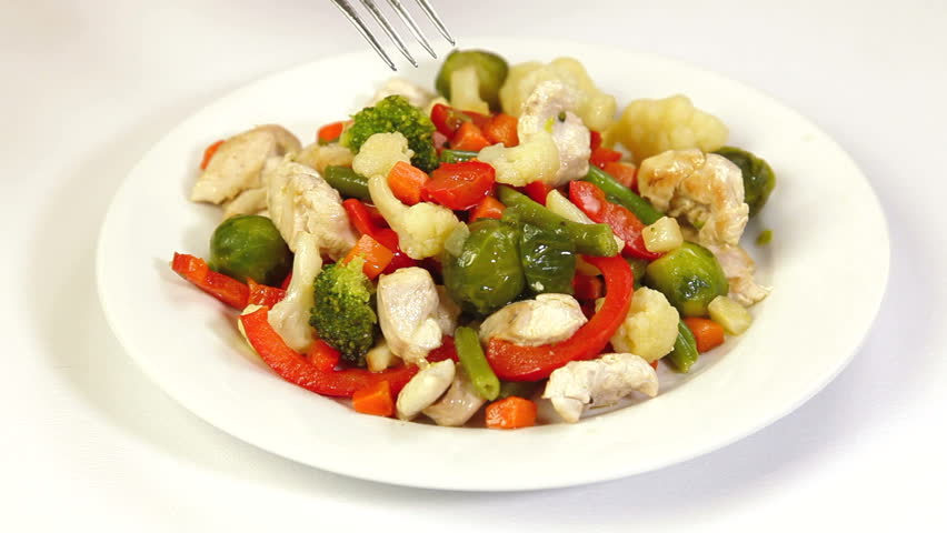 Eating Chicken Meat and Vegetable Stir FryEating Chicken Meat and Vegetable Stir Fry