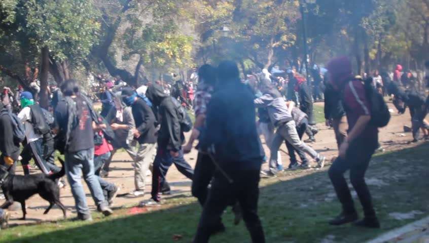 SANTIAGO, CHILE - SEPTEMBER 22: Street damage caused during a student strike on September 22, 2011 in Santiago, Chile. Protesters demand the government to improve education quality.