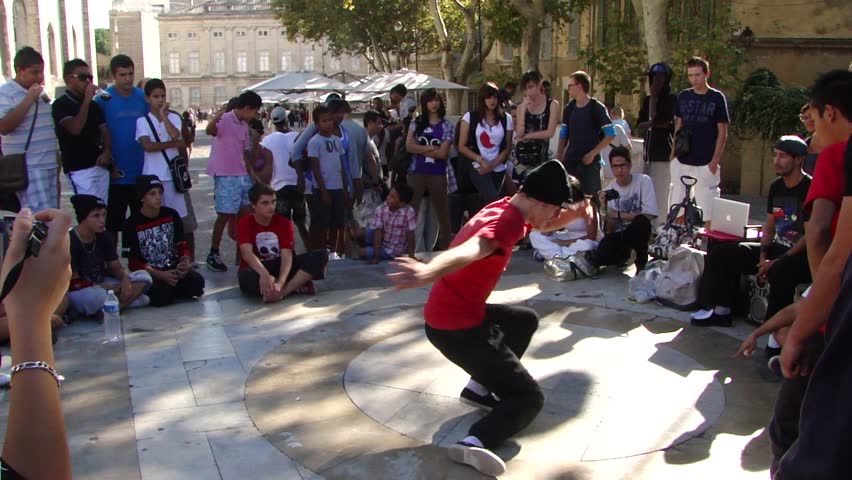 AVIGNON, FRANCE - OCT 1: 	Hip-Hop breakdancers compete in pairs, 	on the Plaza of the Palace of Popes, on Oct 1, 2011, in Avignon, France.
