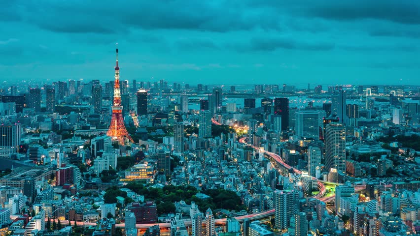 Timelapse view of Tokyo skyline and showing the hanabi (firework festival) from day till night.