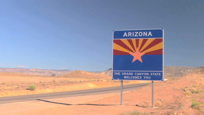 Welcome to Arizona sign, along Interstate 15, time lapse