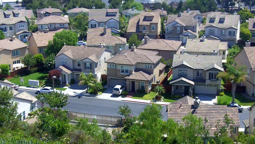 A high angle view of new suburban homes on a residential street in the suburbs of Los Angeles. 