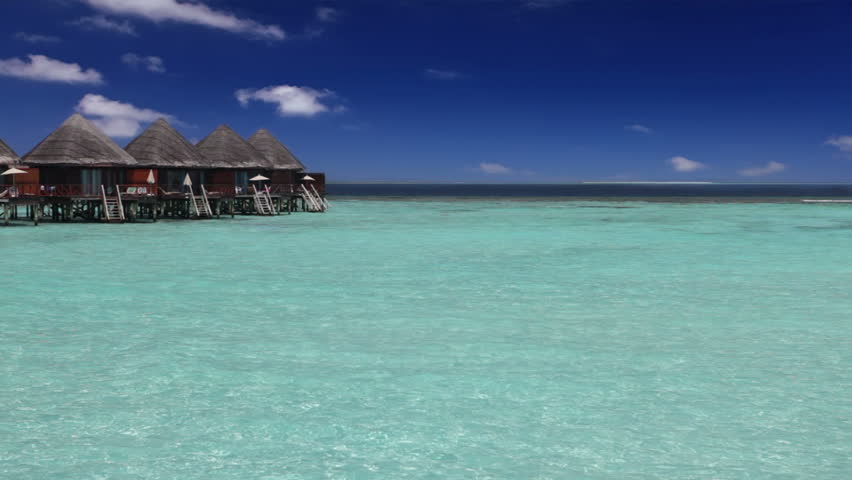 Island in ocean, overwater villas 