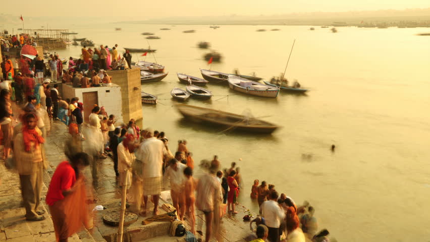 INDIA - NOVEMBER 21: Indian pilgrims having ritual bath at Ganges river on November 21, 2010 in Varanasi, India.