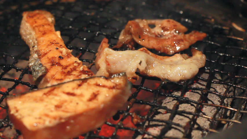 BBQ meat on grill look hot and burn
