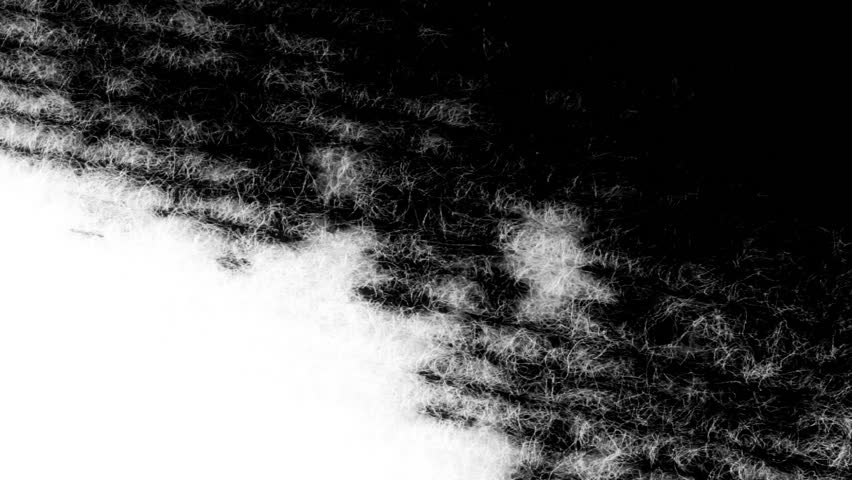 Dripping  Ink on Paper. The paper absorbs Ink paint. Macro.