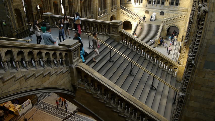 LONDON, SEPTEMBER 2012. Natural History Museum London. Main entrance gallery staircases. Many visitors moving around