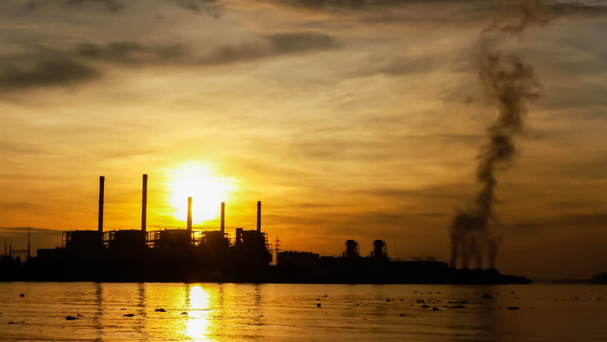 Electric power station at sunrise, time lapse