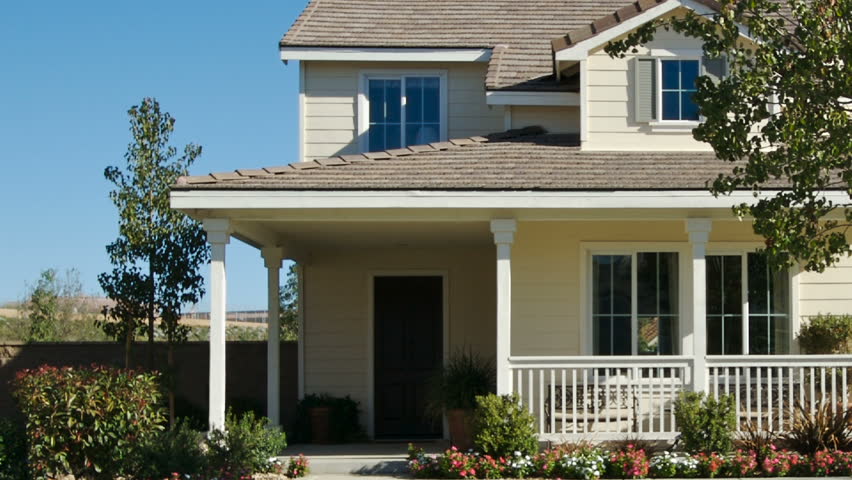 House and Dropping Real Estate Sign with Twirling and Landing Sold Sign  in 1080 HD.