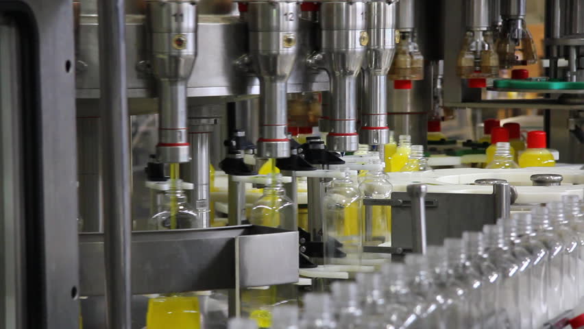 Liquid detergent on automated production line. Machinery for bottling