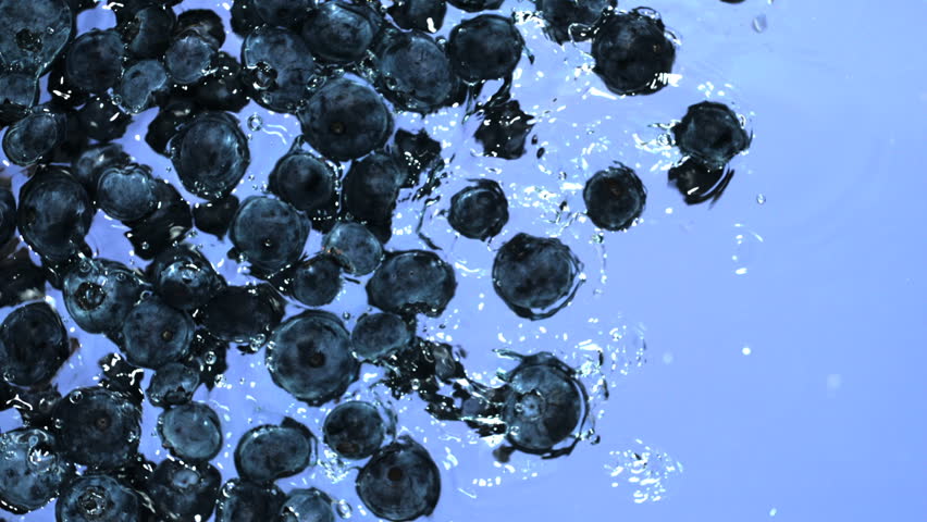 Blueberries in water shooting with high speed camera.