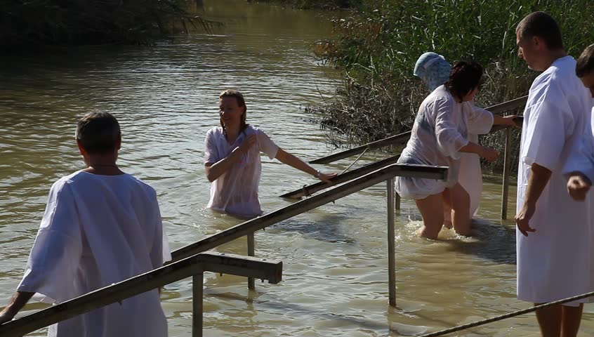 QASR AL YAHUD, ISRAEL â JANUARY 18: Greek Orthodox pilgrims baptize during the Epiphany at Qasr Al Yahud, Israel, January 18 2012
