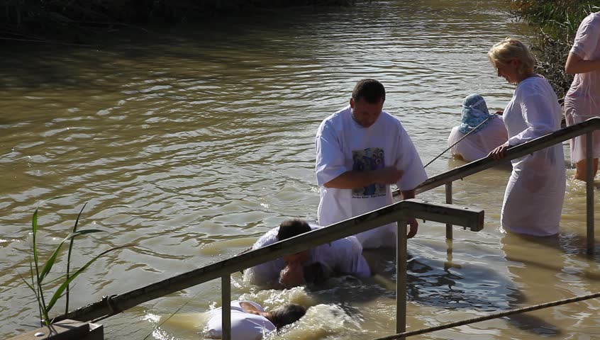 QASR AL YAHUD, ISRAEL â JANUARY 18: Greek Orthodox pilgrims baptize during the Epiphany at Qasr Al Yahud, Israel, January 18 2012