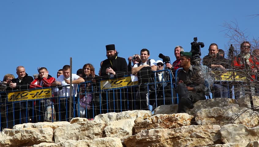 QASR AL YAHUD, ISRAEL â JANUARY 18: Greek Orthodox pilgrims wait for baptism during the Epiphany at Qasr Al Yahud, Israel, January 18 2012