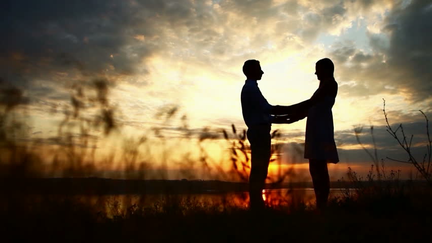 loving couple at sunset