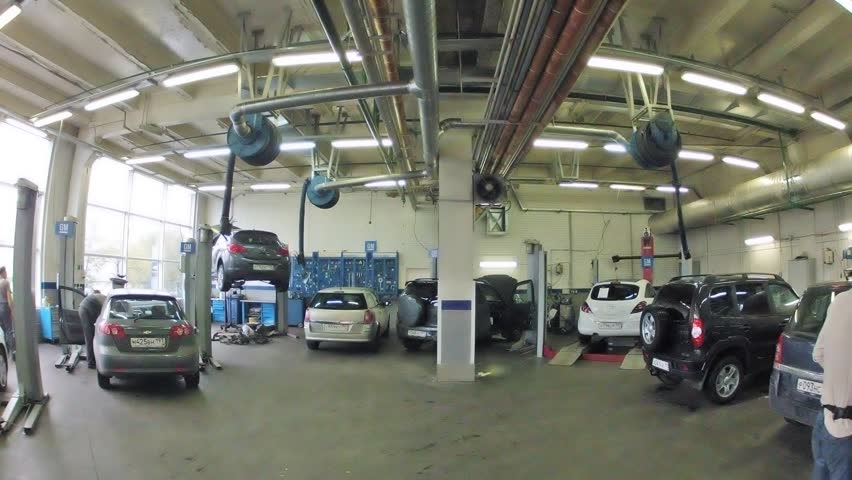 MOSCOW - AUG 27: (Timelapse View) Cars stand in garage of service center of Automobile Dealership Automir, on on Aug 27, 2012 in Moscow, Russia. Automir represents 21 leading automobile brands